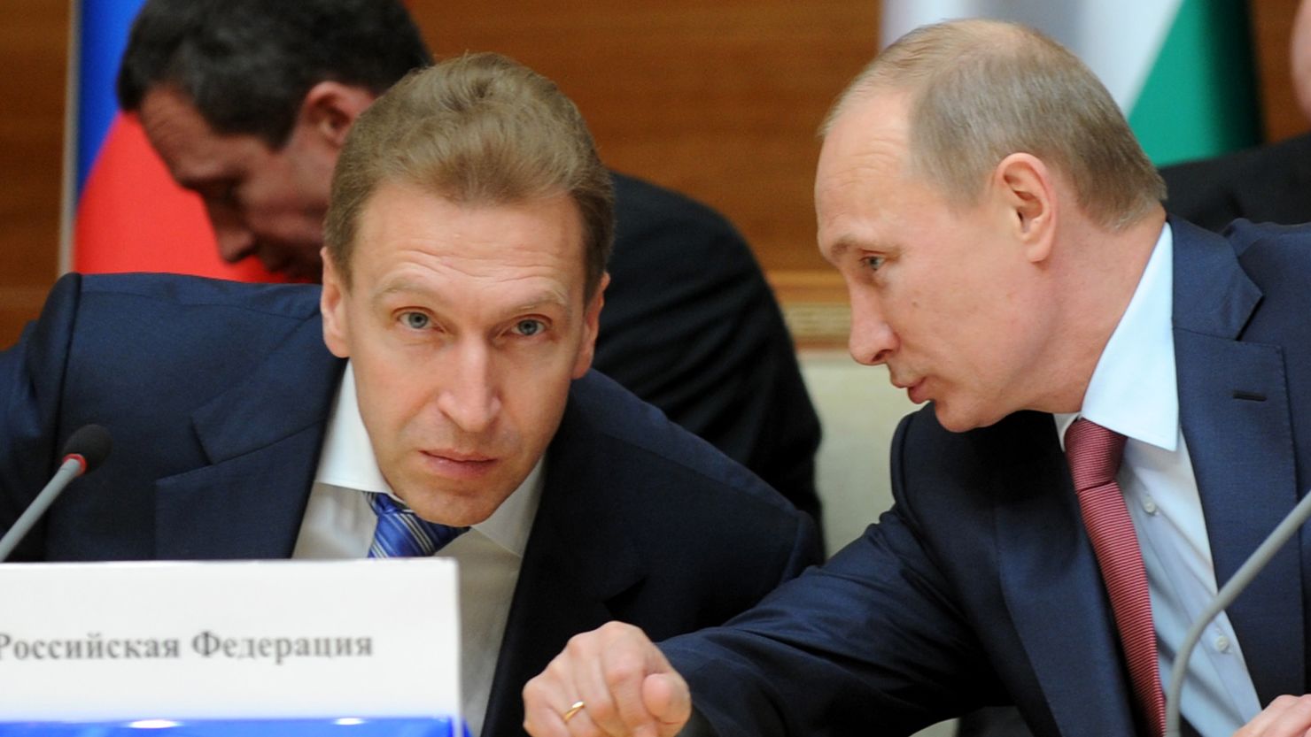 Vladimir Putin, right, speaks with Igor Shuvalov during a prime ministers from ex-Soviet states meeting in Minsk on May 19, 2011. 