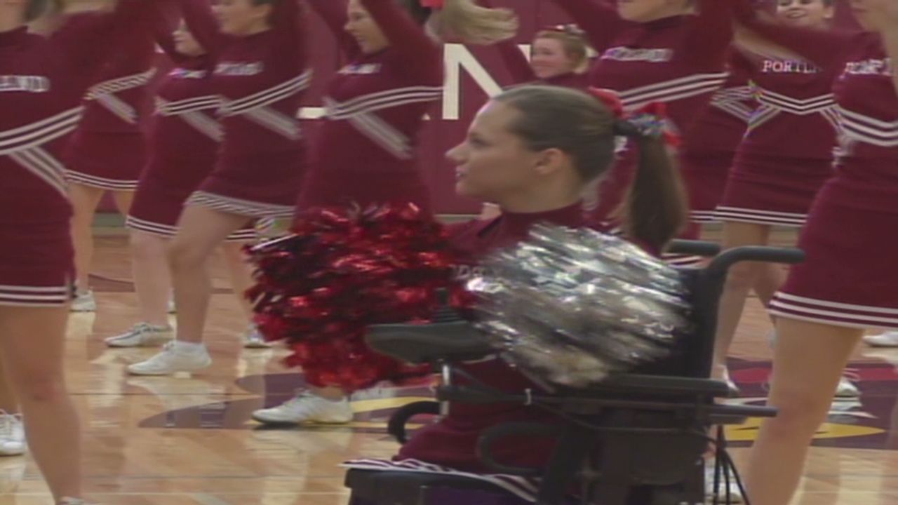 Disabled girl lives cheerleading dream