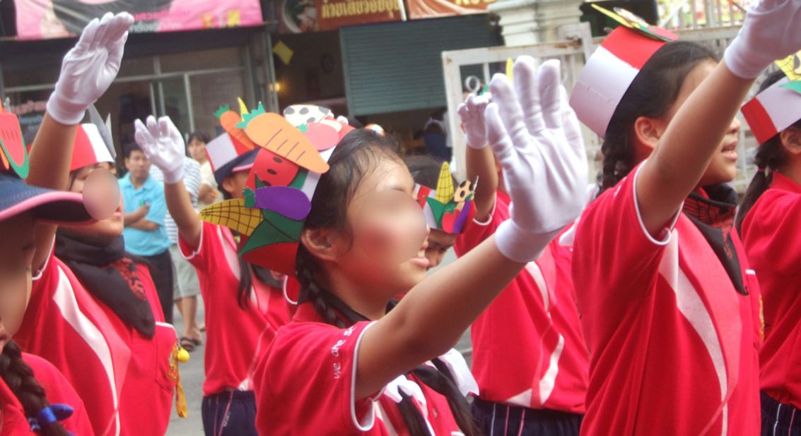 Many of the children gave the infamous "Sieg Heil" salute of the Nazis as crowds watched on. 