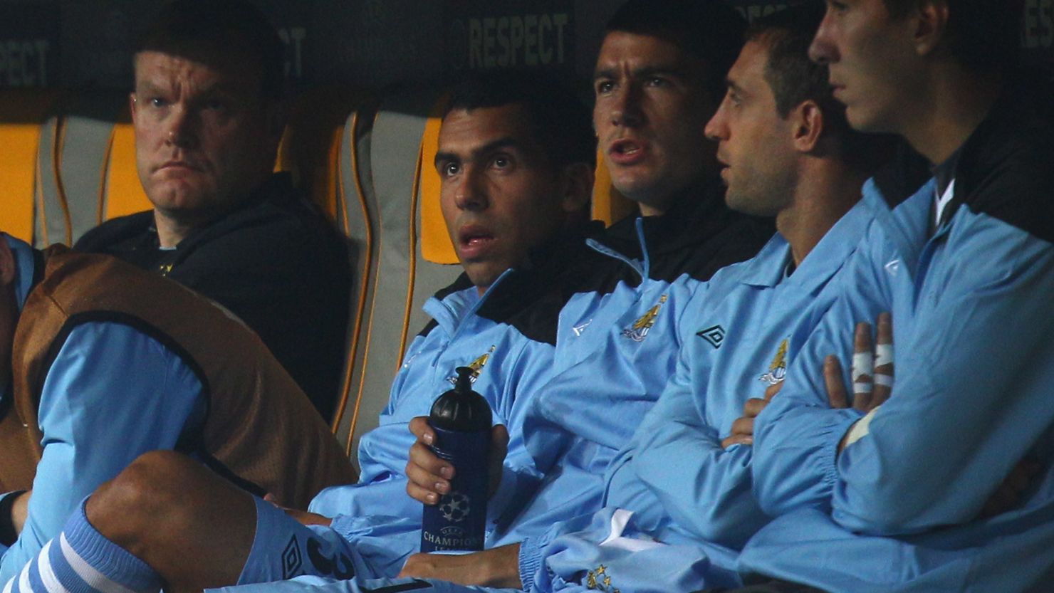 Carlos Tevez sits with the other Manchester City substitutes at the Allianz Arena on Tuesday.