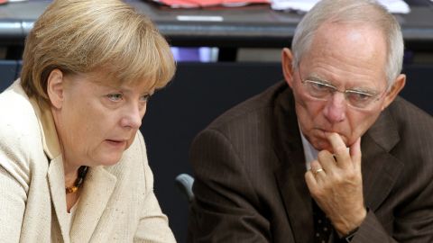 German Chancellor Angela Merkel, left, with Finance Minister Wolfgang Schauble at the lower house of parliament in Berlin.