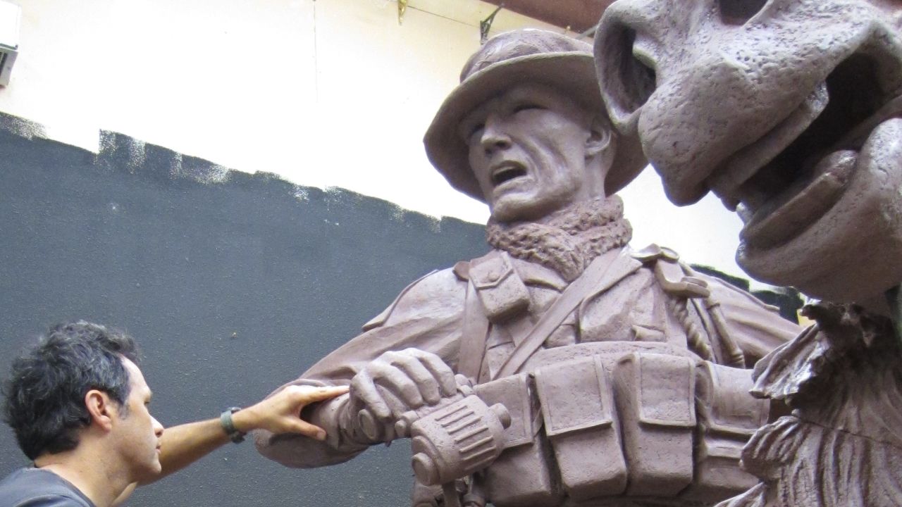 Artist Douwe Blumberg puts final touches on a clay sculpture that will honor U.S. special operations forces.