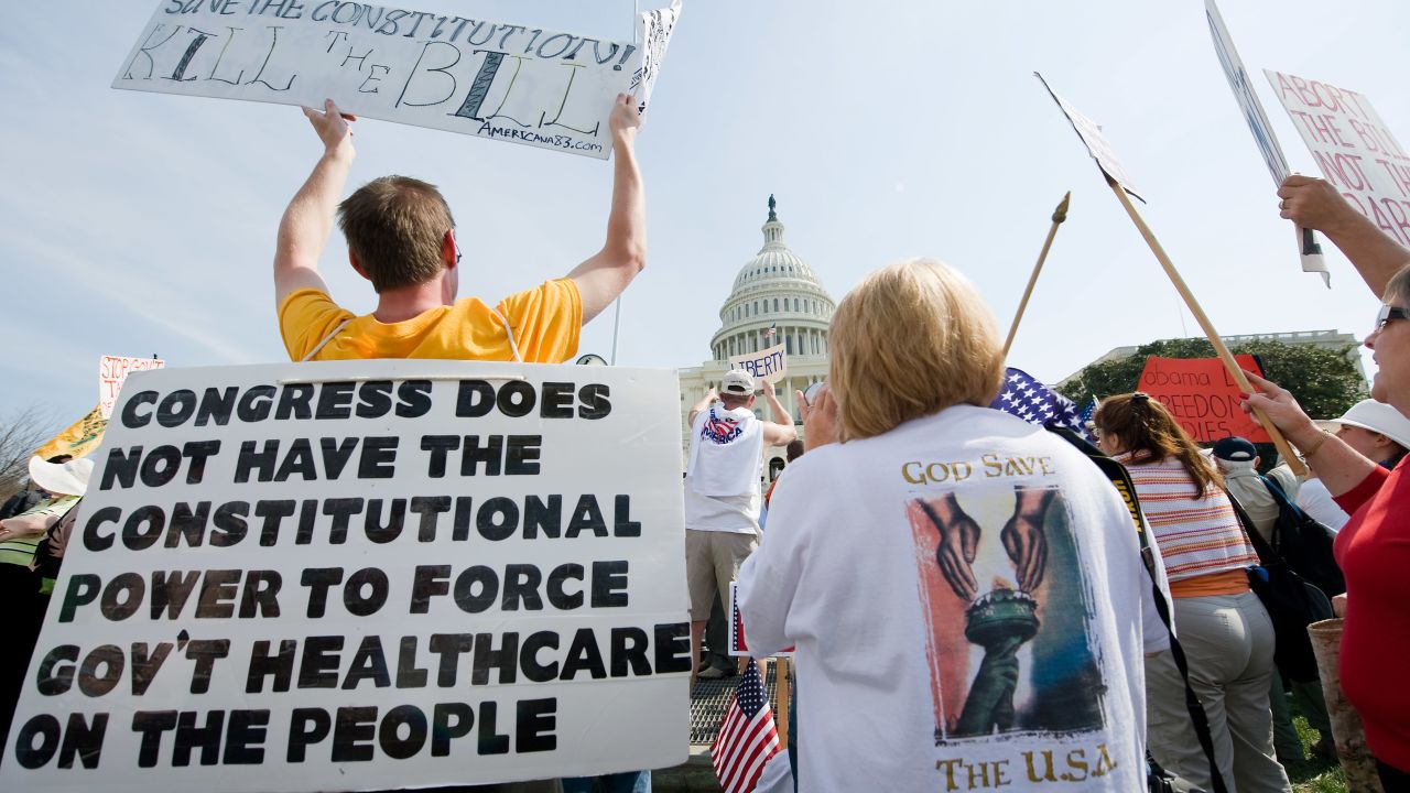 Tea Party demonstraters outside the U.S. Capitol protest the health care bill, claiming it's not constitutional, in March 2010.