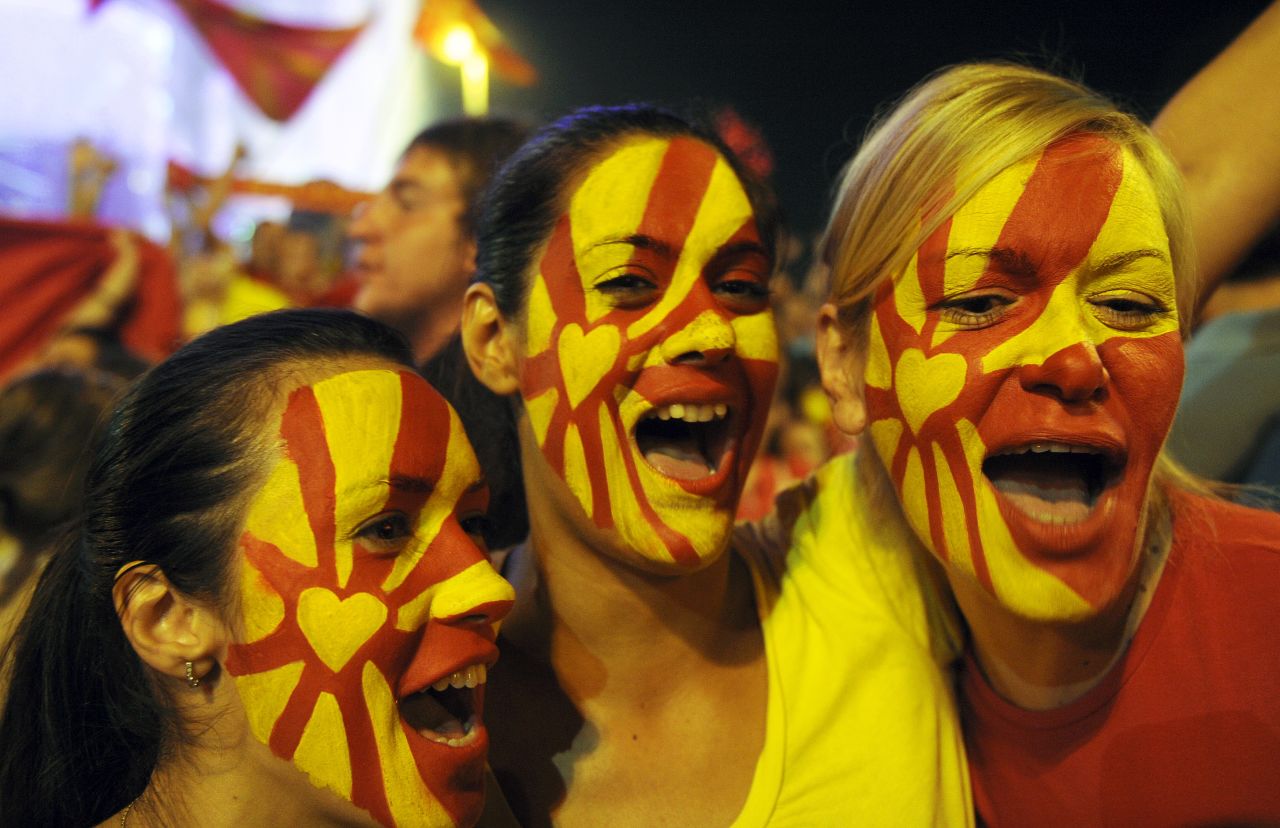 Young women in Skopje show their true colours by painting their faces in the colors of the Macedonian flag 