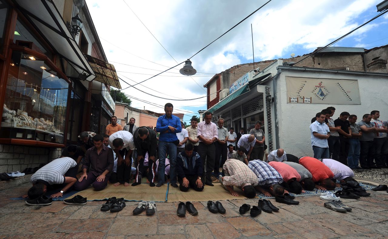 Muslim craftsmen perform their prayers in an alley in the Old Bazaar in Skopje. Accordinng to the CIA World Factbook a third of Macedonia's population are Muslim.