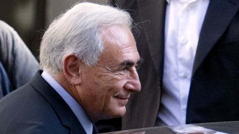 Dominique Strauss-Kahn leaves the financial crimes unit in Paris after meeting with his accuser Tristane Banon.