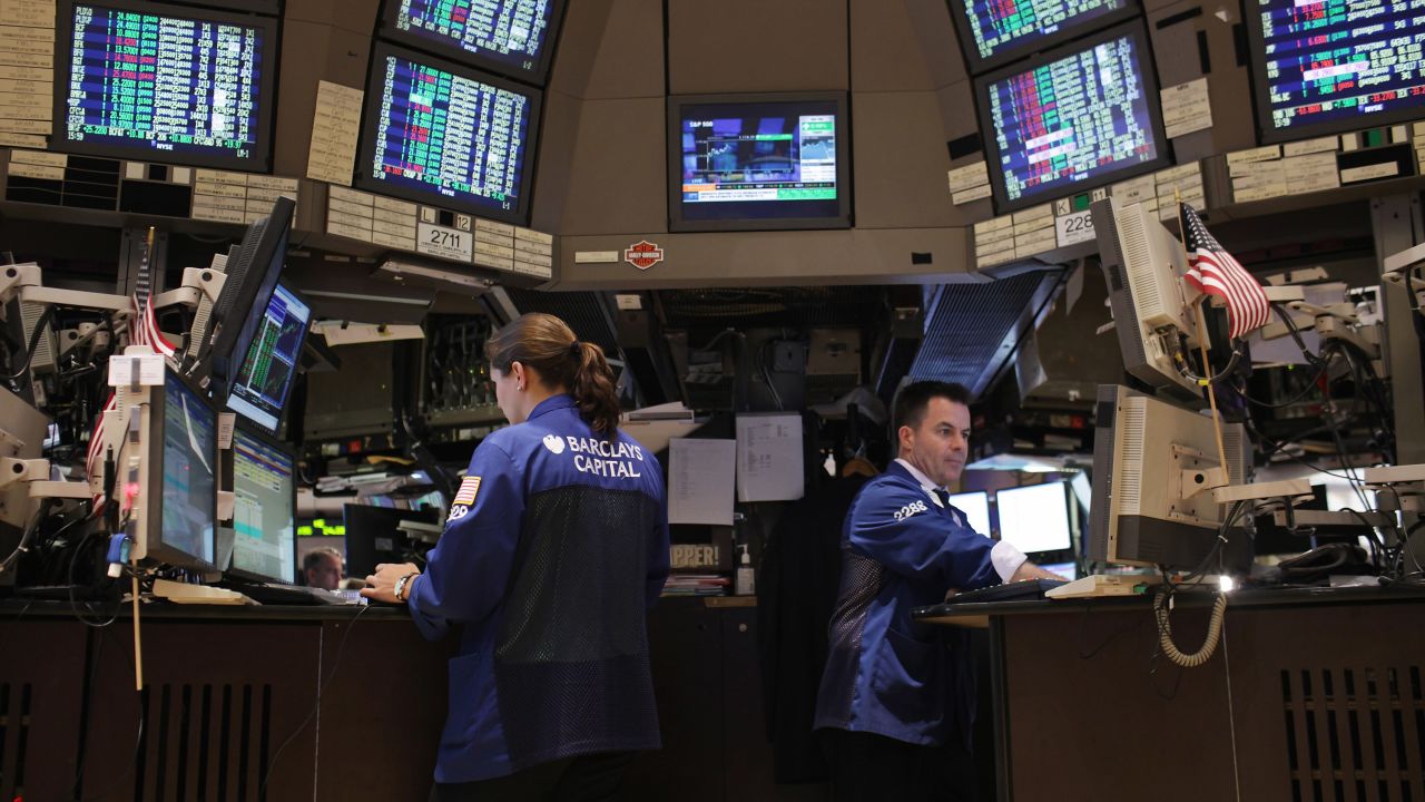 Traders work on the floor of the New York Stock Exchange (NYSE) on September 27 in New York City.