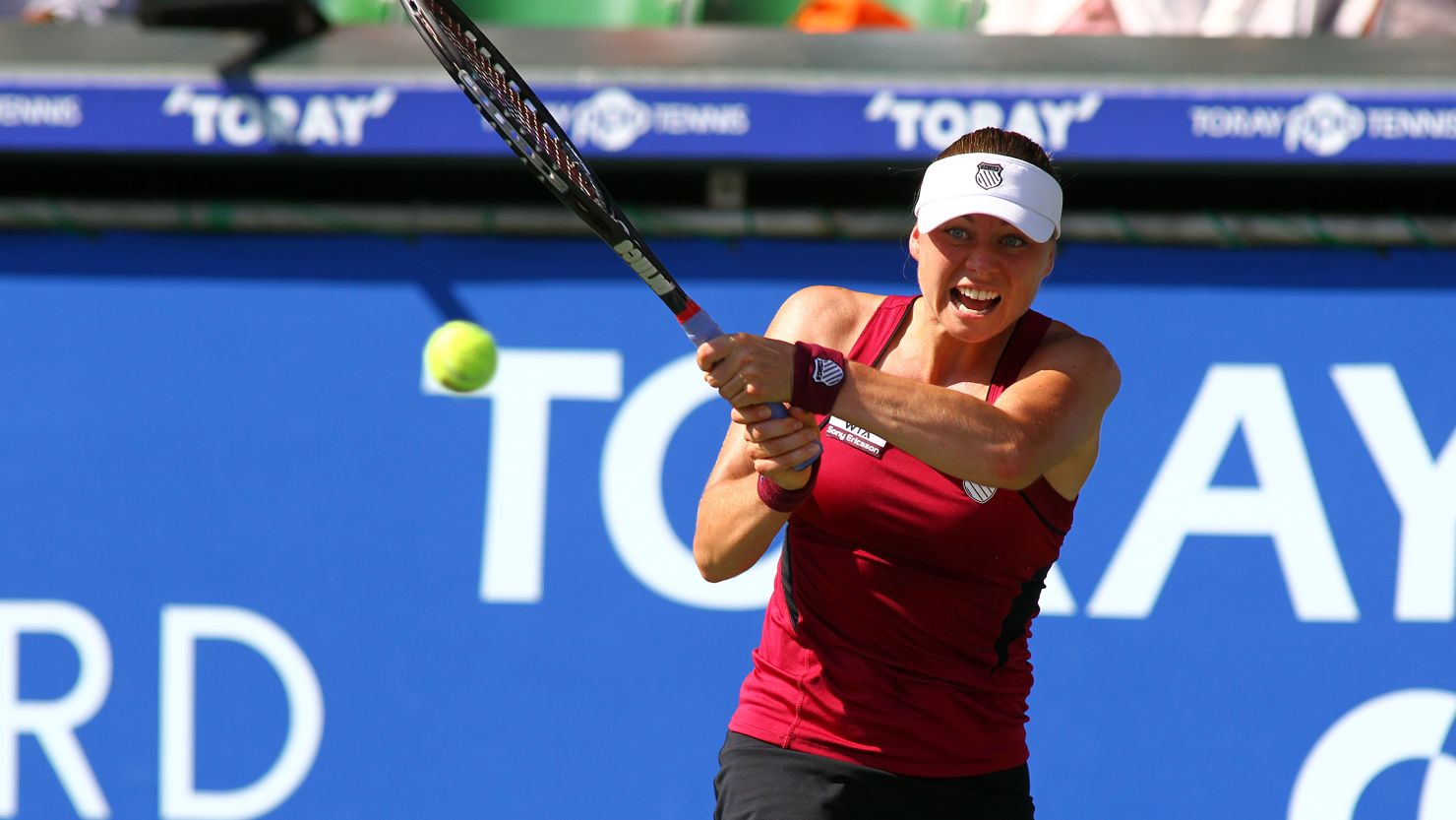 Vera Zvonareva powers a shot during her straight sets win over Petra Kvitova in Tokyo