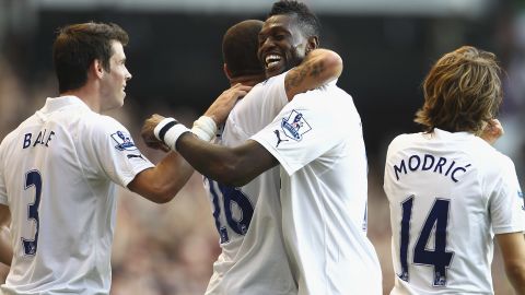 Kyle Walker is hugged by Emmanuel Adebayor after scoring the winner in Tottenham's victory over Arsenal