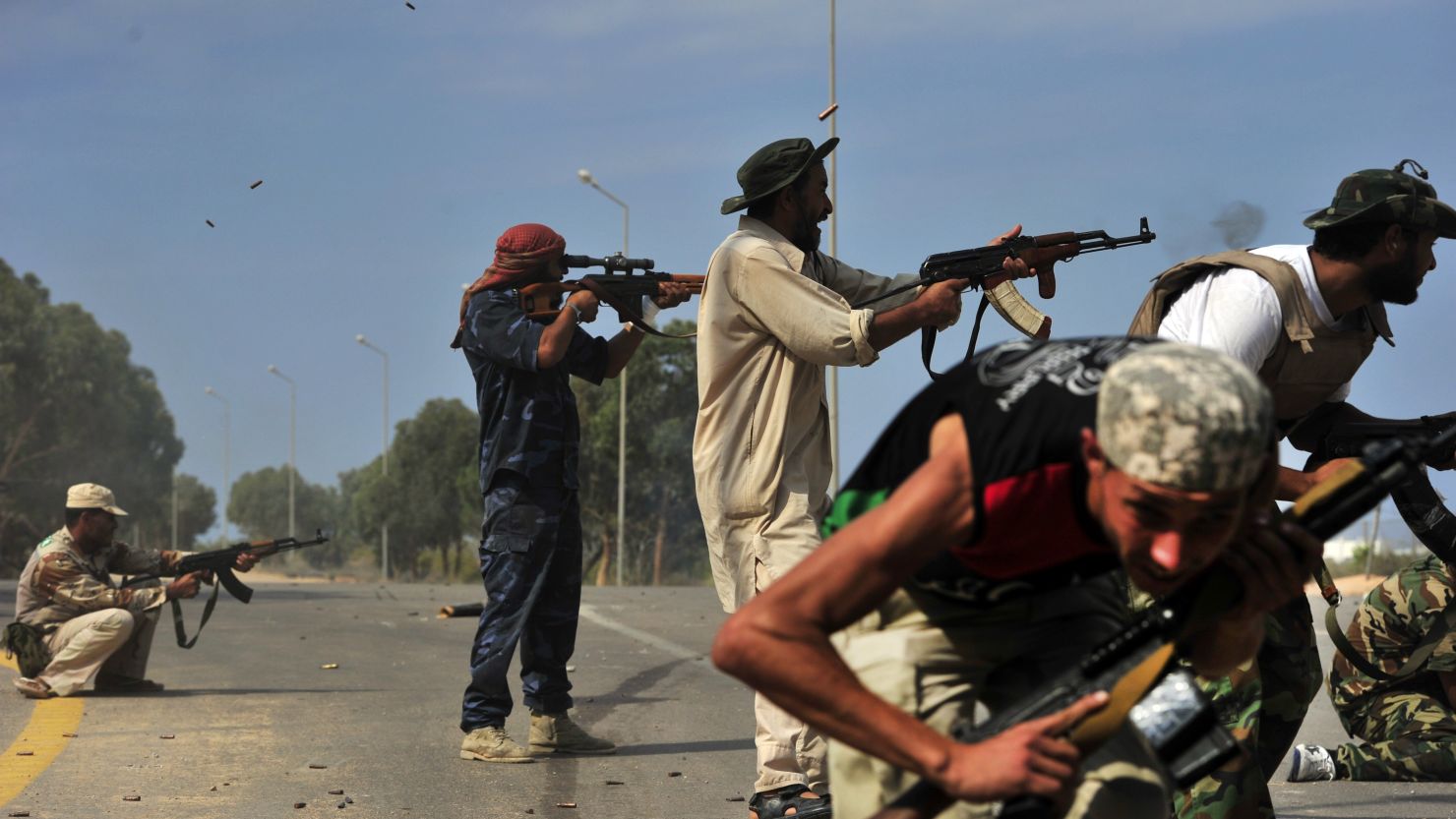 National Transitional Council fighters battle loyalist forces in Sirte, Libya, on Saturday.