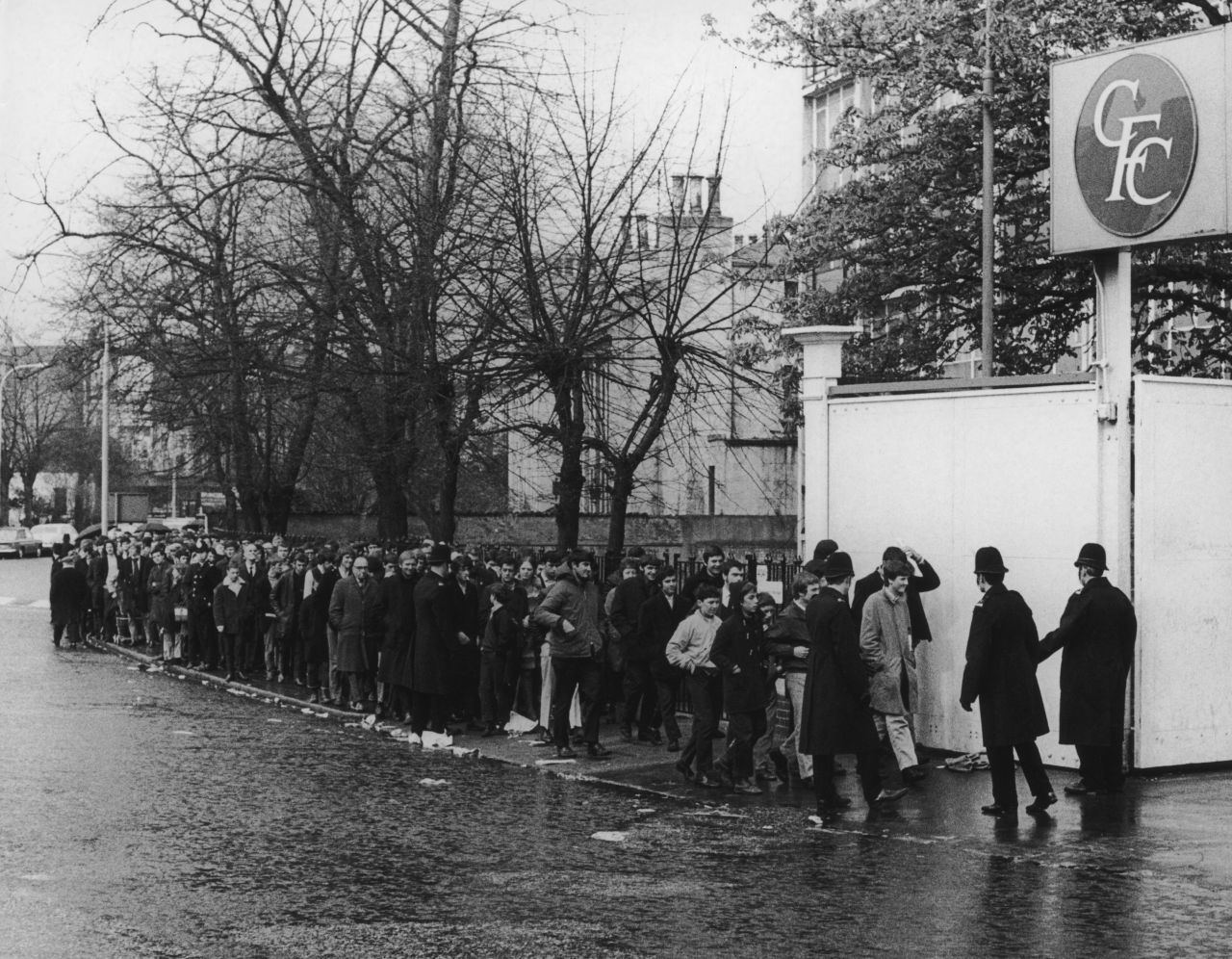 Chelsea fans queue for tickets to the 1970 FA Cup final replay between Chelsea and Leeds United, outside their club's Stamford Bridge ground. 