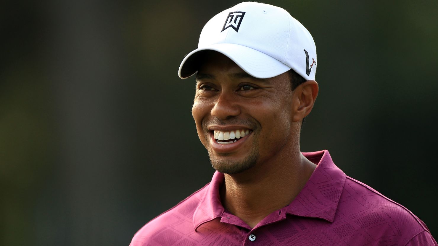 Former world No. 1 Tiger Woods still has plenty to smile about off the golf course despite his slump in form.