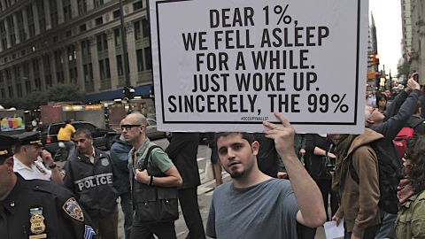 A protester holds a sign at the Occupy Wall Street protest last weekend