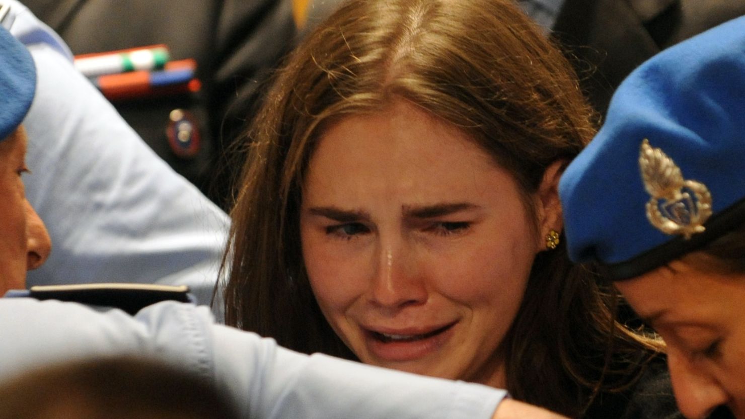 Amanda Knox reacts to the announcement of the acquitted verdict of her appeal trial at Perugia's court in 2010.