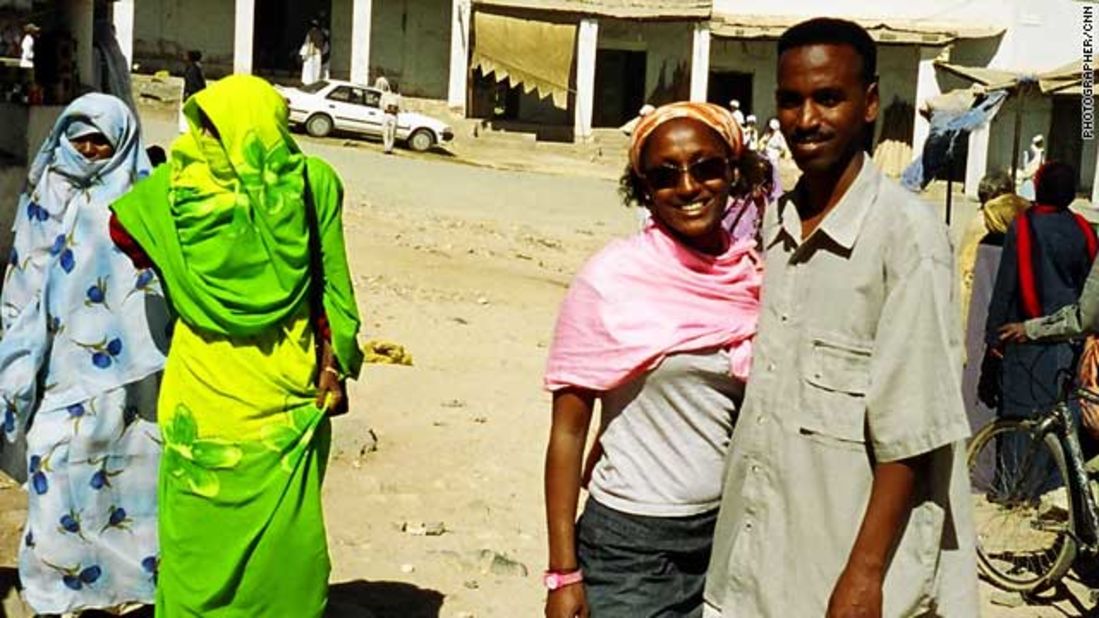 Pool with her brother, Zemichael, in Eritrea.