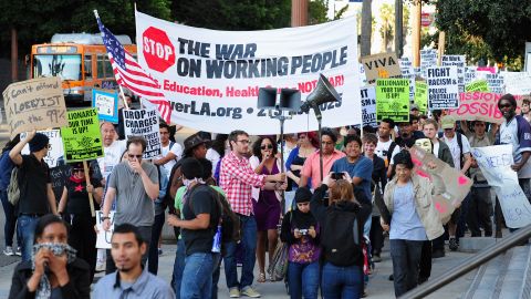 Occupy Wall Street protests are taken up in Los Angeles, as demonstrators march through downtown October 3.