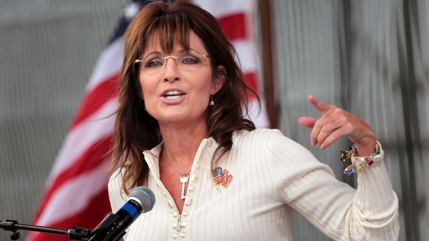 Former Alaska Gov. Sarah Palin speaks to supporters during the Tea Party of America's "Restoring America" event on September 3, 2011, in Indianola, Iowa.