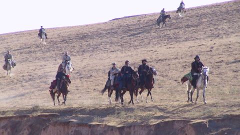 U.S. Special Operations Forces ride into northern Afghanistan in October 2001 on horseback