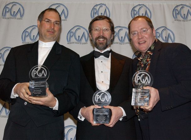 <a href="http://www.cnn.com/specials/tech/steve-jobs-the-man-in-the-machine">Jobs</a>, from left, Ed Catmull and John Lasseter celebrate an award for Pixar at the 13th Annual Producers Guild Awards in March 2002 in Los Angeles.