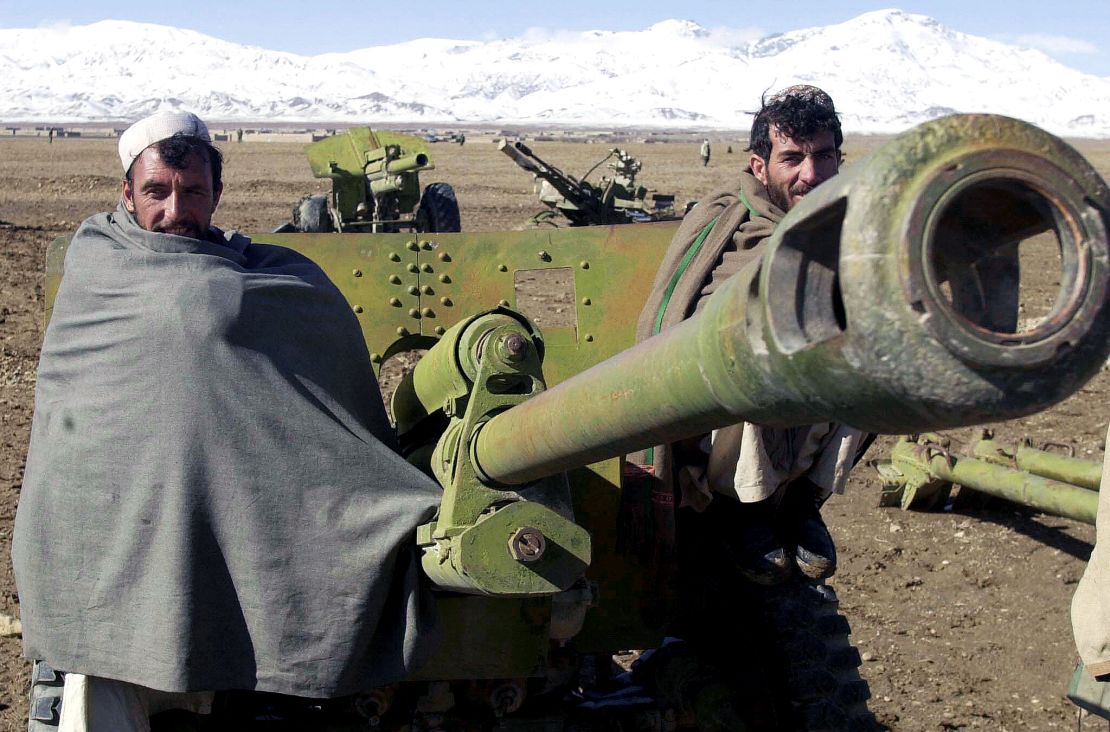 Afghan militiamen pose during a disarmament cermony in Gardez, the capital of Paktia province, November 2003.