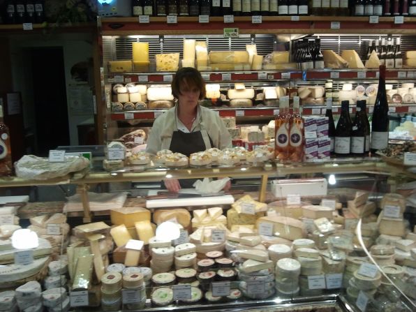 A fromagerie on Rue Cler offers hundreds of varieties of cheeses for sale.