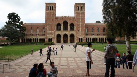 Students sit on campus at UCLA. A new California law will allow immigrants to receive state funds.