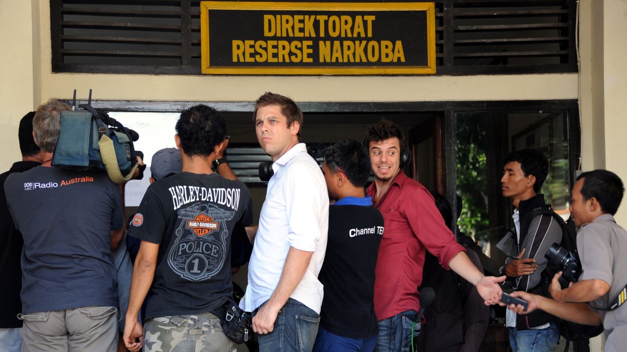 Journalists gather at a police station in Bali where a 14-year-old Australian boy was reportedly held for possesing cannabis.