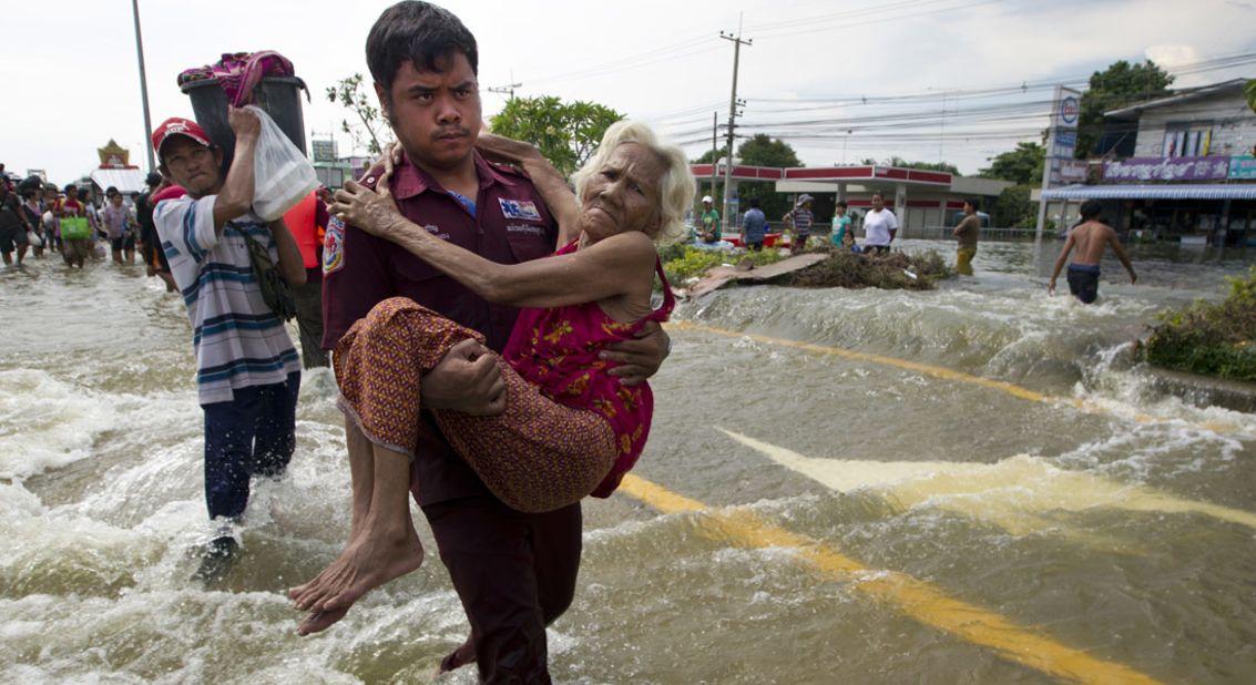 An elderly woman is evacuated as flooding causes havoc on October 9, 2011 in Ayutthaya, Thailand. 