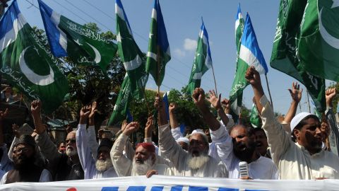 Hard-line Islamists protest against court verdict sentencing convicted killer Malik Mumtaz Hussain Qadri, in Karachi on October 7.