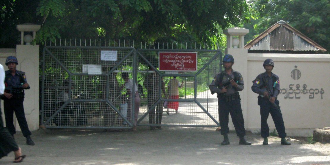 Soldiers stand guard in front of the Insein prison in Yangon on May 18, 2009.