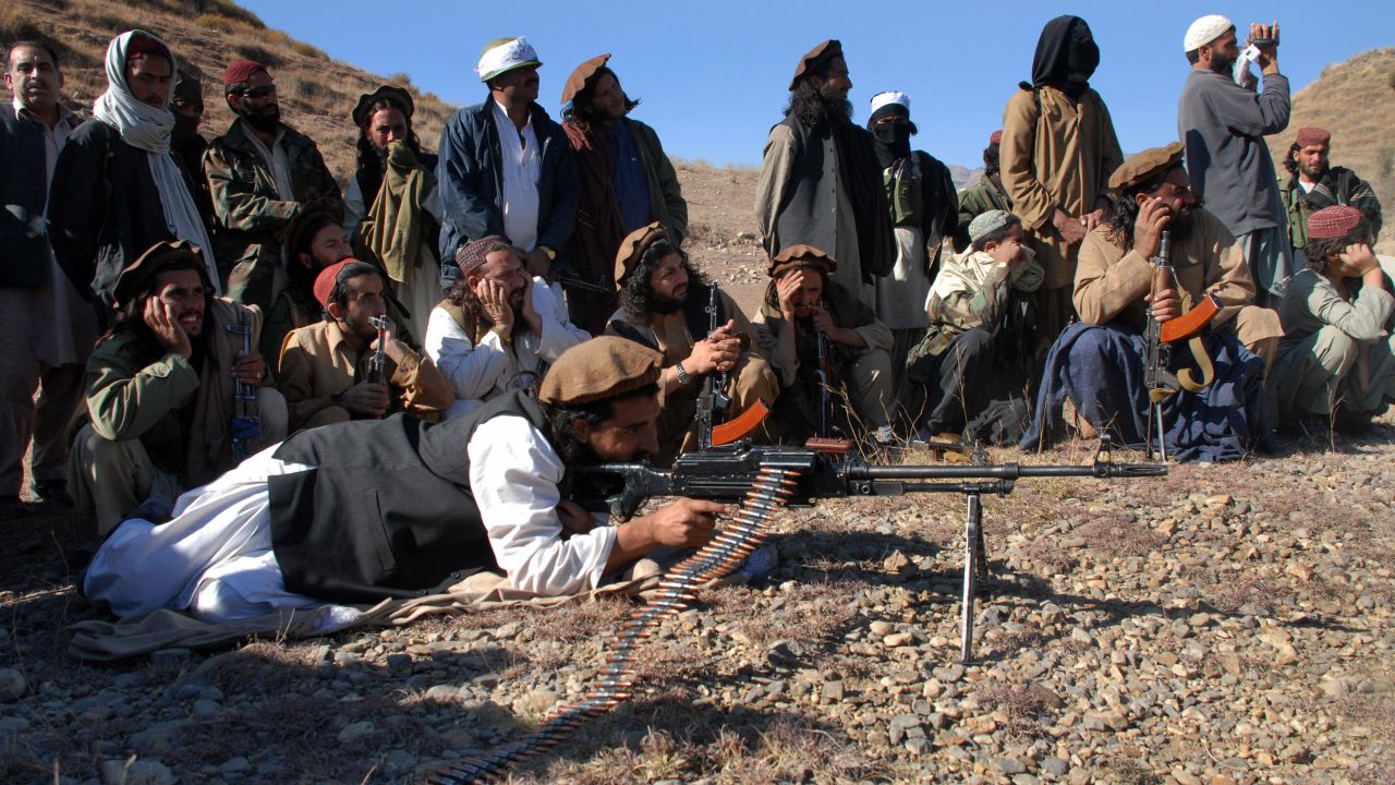 Pakistani Taliban gather in an open area of Mamouzai in Orakzai Agency on November 26, 2008. 