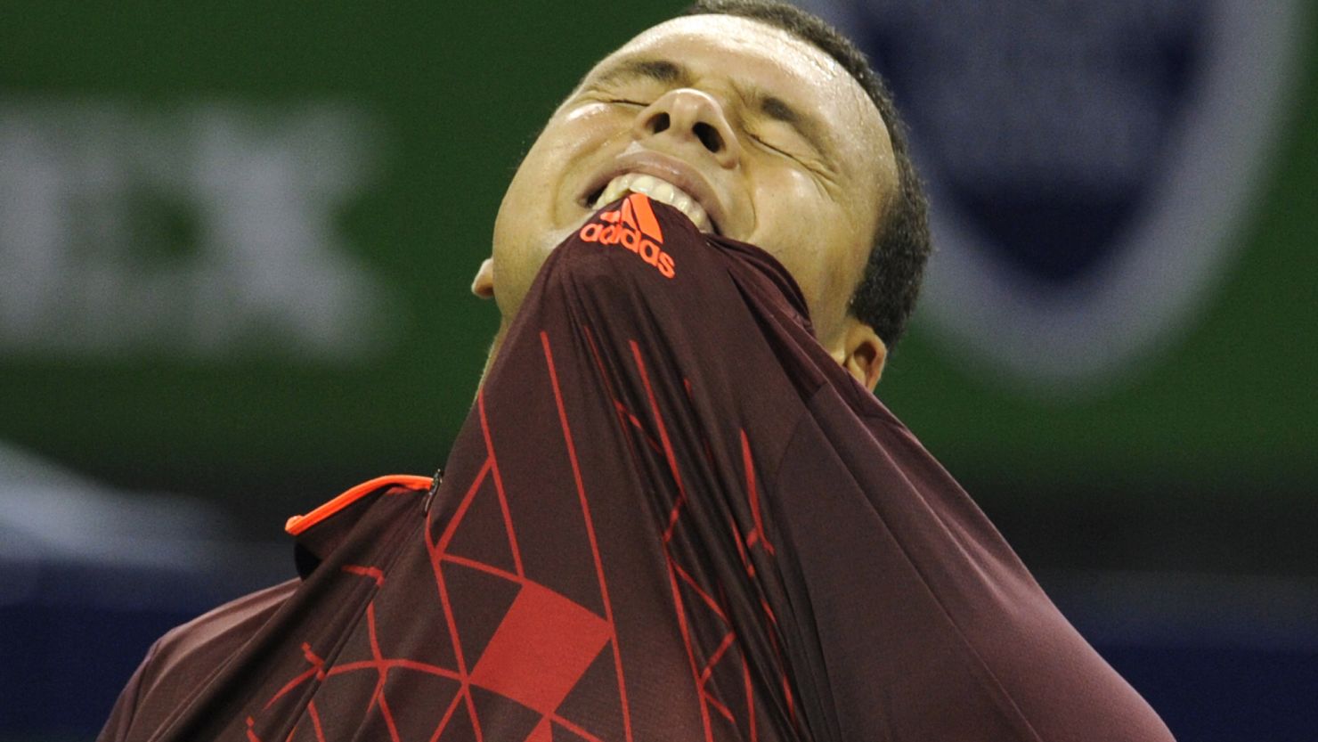 Jo-Wilfried Tsonga feels the pain after slumping out of the Shanghai Masters