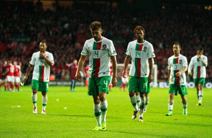 Portugal were left dejected after Tuesday's 2-1 defeat to Denmark in Copenhagen condemned Paulo Bento's side to the Euro 2012 qualification playoffs. Despite the defeat, Portugal are one of four teams seeded for the playoff draw in Kiev on Thursday.