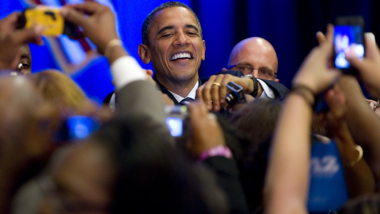 President Barack Obama greets supporters during a Democratic campaign fundraiser this week in Orlando.