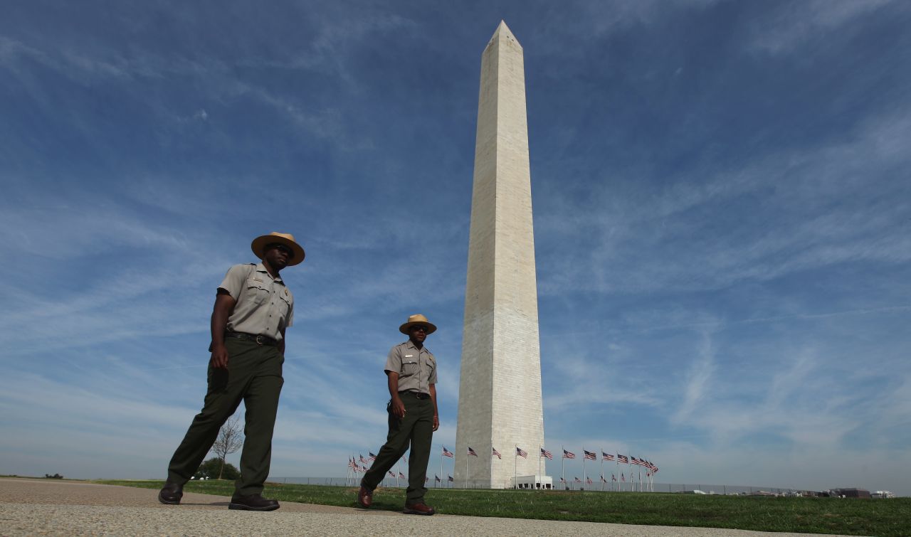 The Washington Monument varies in color because sections of it were started at different times -- in 1854 and later in 1879. The two sections used marble from different quarries, and weathering and erosion have made the difference more noticeable. The momument has been closed temporarily since the August 23 earthquake.