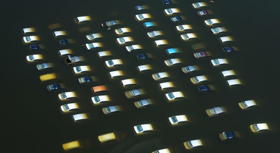 This aerial picture shows cars submerged in floodwaters at a Honda car factory outside Ayutthaya on October 11, 2011.