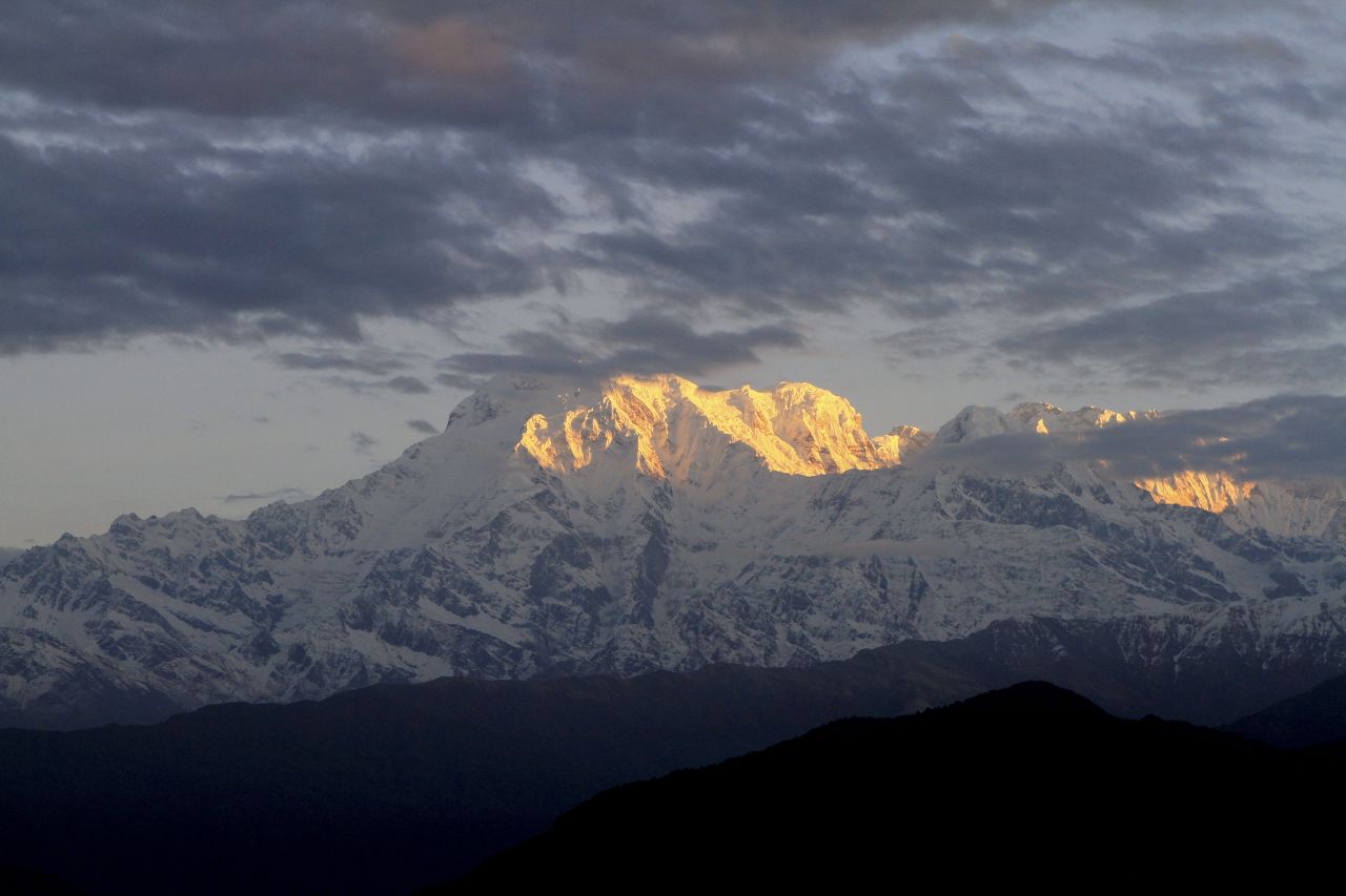  "When the first sunlight hit the Himalayas, I was captured by the soft golden color of the first sunrise," says iReporter Duangmon Chaturapitaporn.