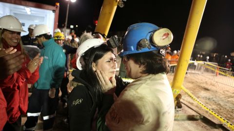 Chilean miner Osman Araya is welcomed by his wife, Angelica, after being rescued from the San Jose mine on October 13, 2010.