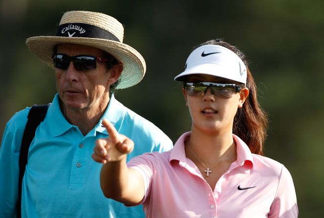 Seen here with former child prodigy Michelle Wie in 2010, Leadbetter has established coaching academies around the world.