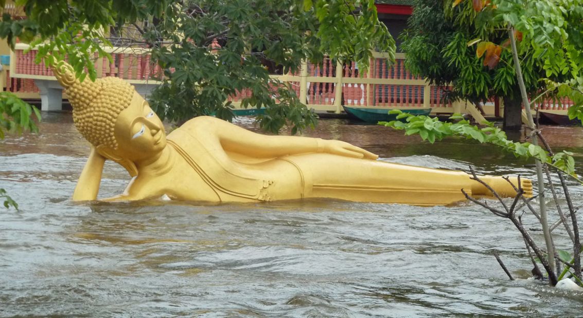 A reclining Buddha in the ancient city of Ayutthaya falls foul of rising waters on October 13, 2011. 