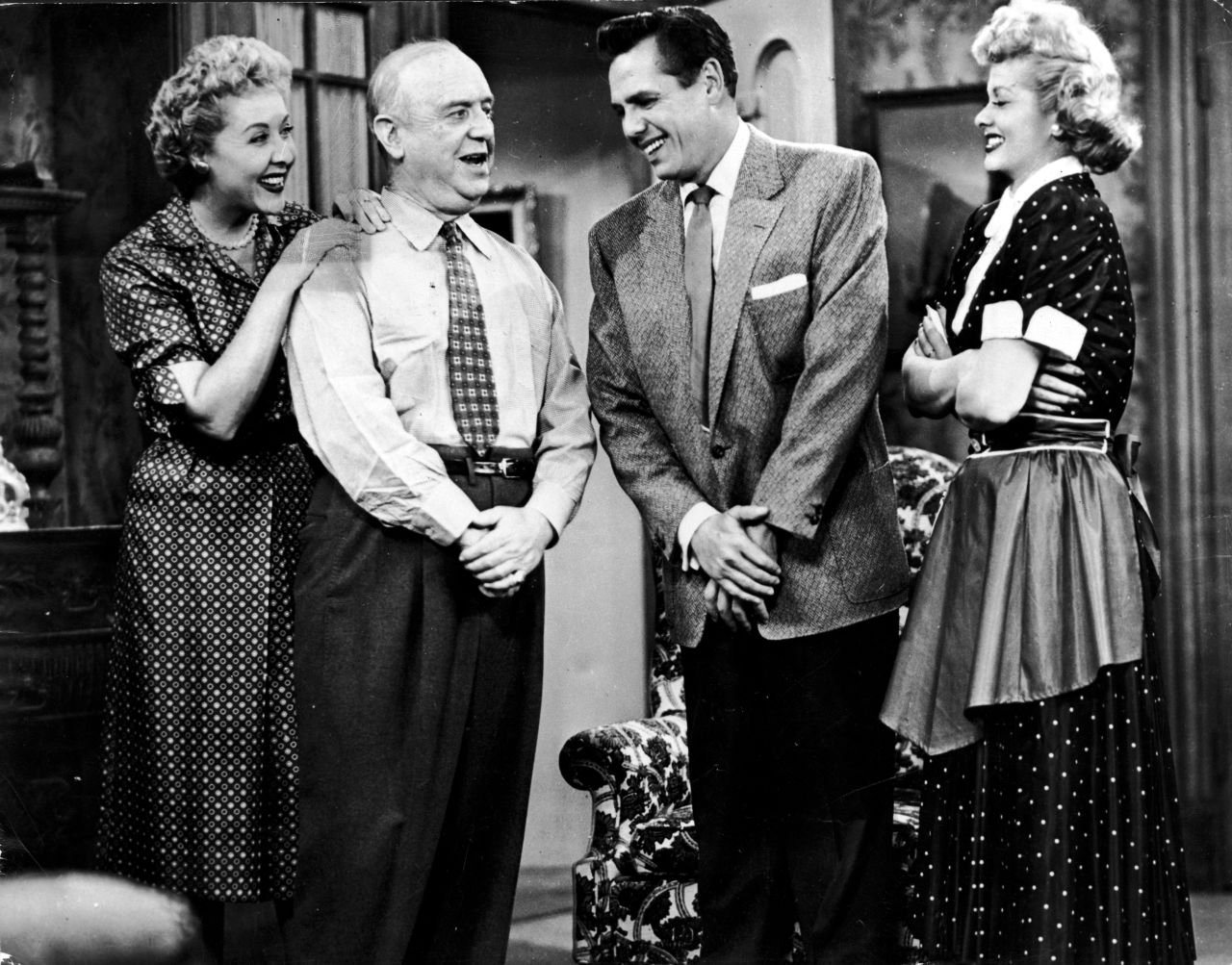 From left, stars Vivian Vance, William Frawley, Desi Arnaz and Lucille Ball talk on the set. "I Love Lucy" invented rerunning episodes when Ball became pregnant and needed rest.