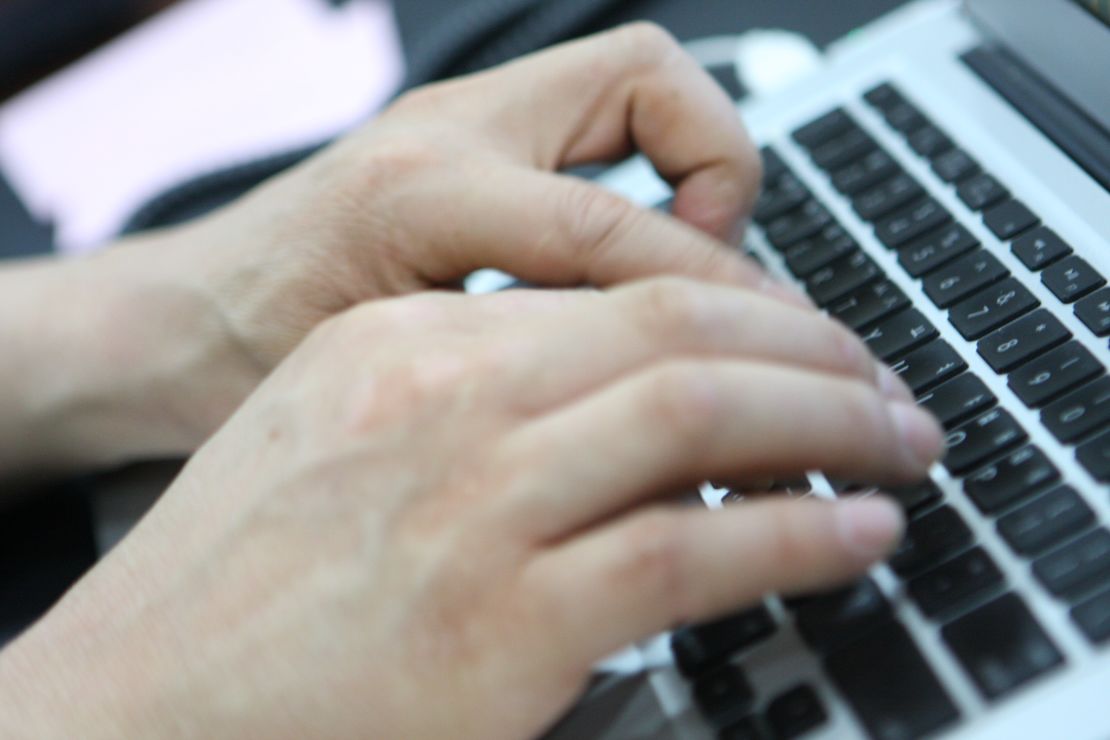 keyboard hands typing laptop