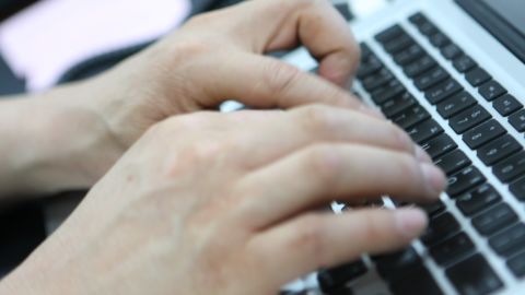 keyboard hands typing laptop