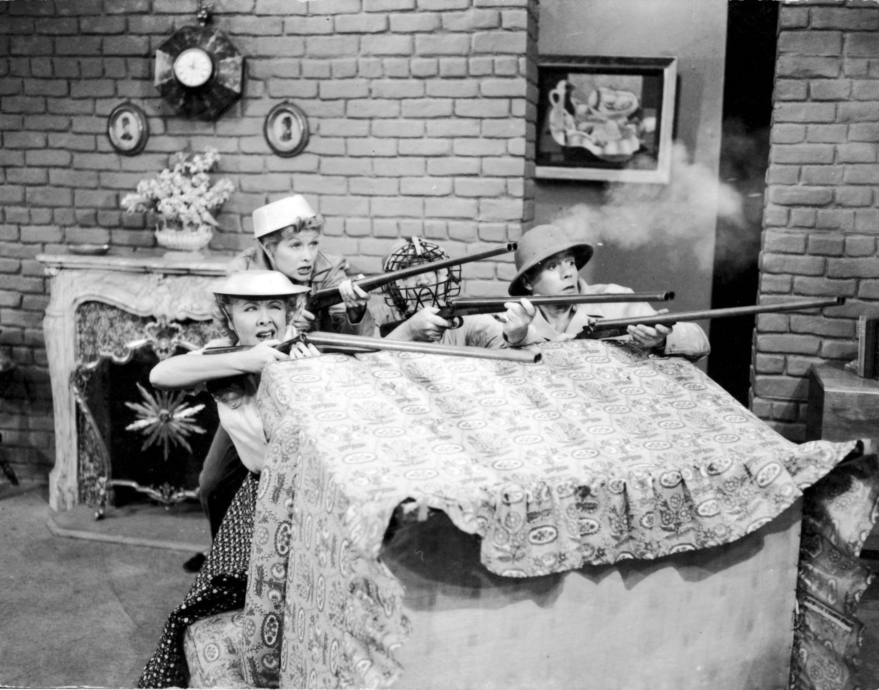 Characters Ethel, Lucy, Fred and Ricky fight a battle in their living room in the 1952 episode "New Neighbors."