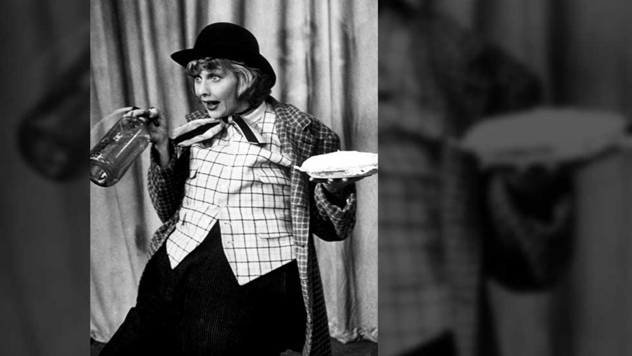 Holding a seltzer bottle and banana cream pie, Ball acts for "The Ballet" episode in 1952, where Lucy tries to land a gig at Ricky's club.