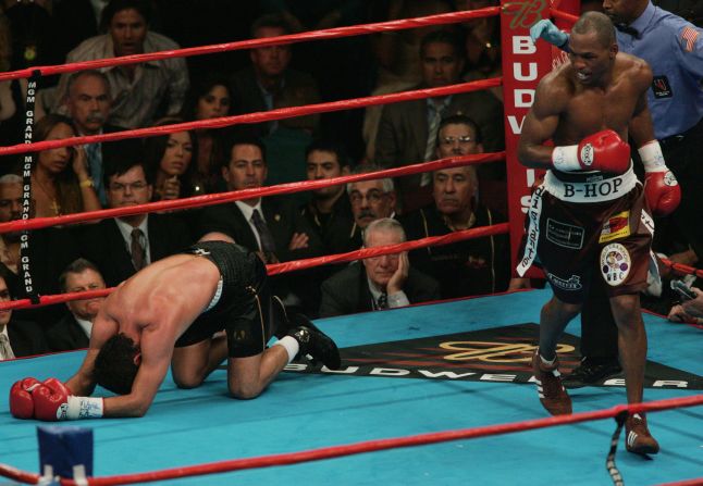 In 2004, Hopkins knocked out Oscar de la Hoya in the ninth round of their Las Vegas middleweight bout to become the first boxer to unify the belts of all four major sanctioning bodies.