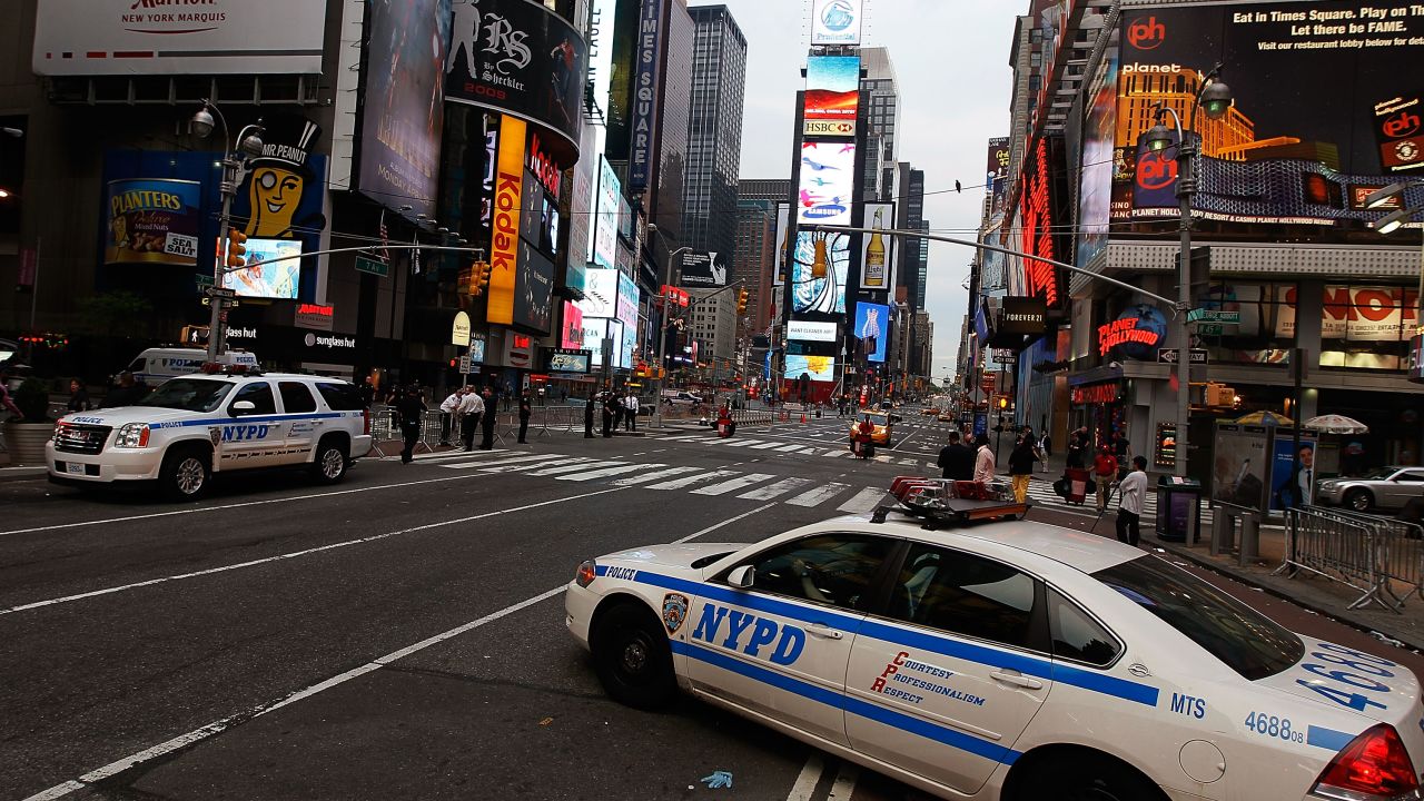 Police cruisers guard where a car bomb had been parked in Times Square in May 2010.