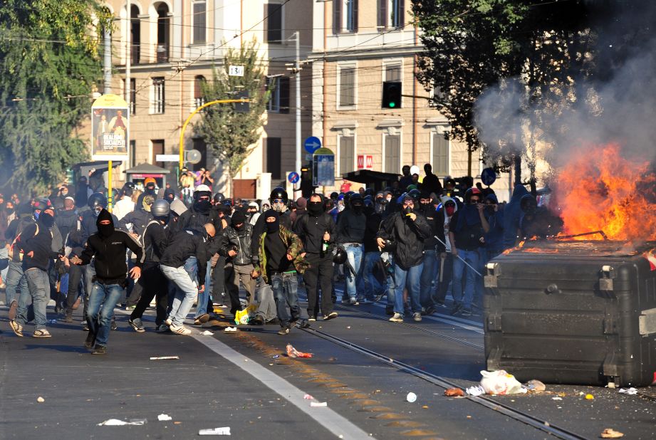 Vandalism erupts in Rome on Saturday as protesters initially took peacefully to the streets to speak out against corruption. Anarchists clashed with police and other protesters who attempted to extricate the rowdy demonstrators from the march. Tens of thousands of protesters marched in Rome as part of a global day of protests.