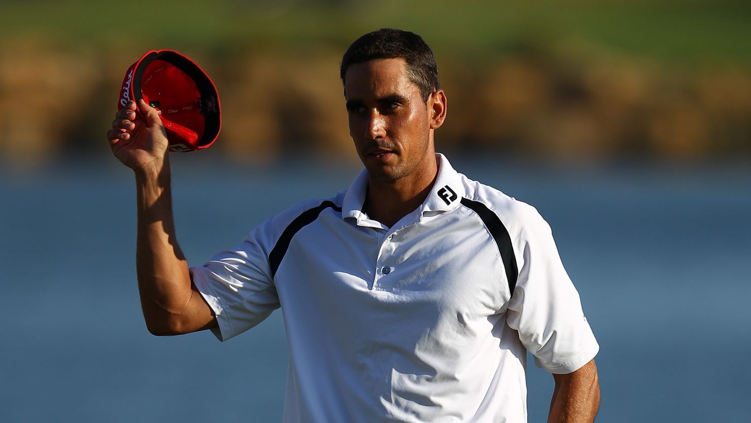 Rafael Cabrera-Bello takes the applause after finishing his round of 64 in Portugal. 