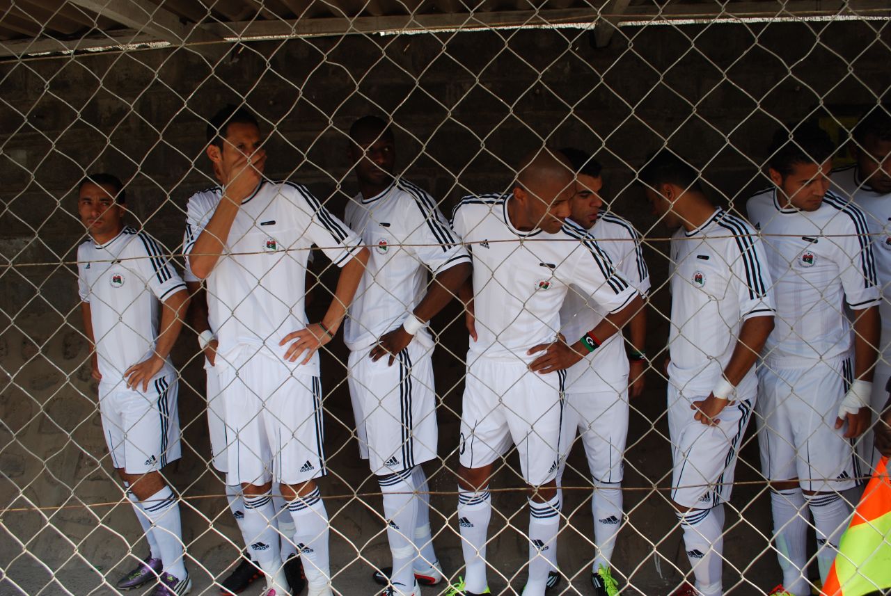 The Libya team wait nervously in the tunnel, waiting for the moment to walk out on to the pitch. There was some confusion over which of Libya's national anthems would be played. The Zambian government is yet to recognize the National Transitional Council.  